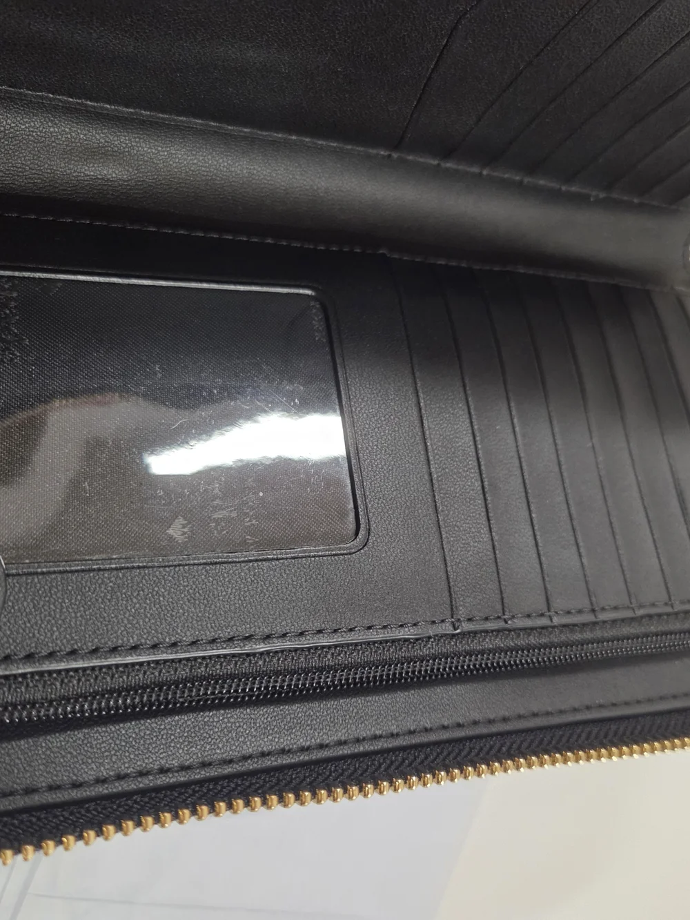 kate spade New York Black Saffiano Wristlet with Gold Logo